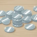 silver coins on the table